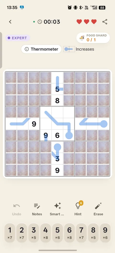 A Thermometer board: pale blue thermometer bars drawn across the grid, several of them running over cells still hidden by fog